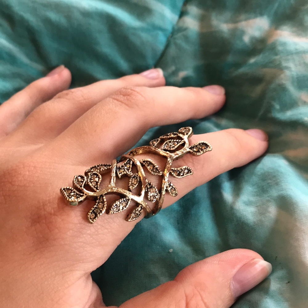 Gold toned knuckle ring